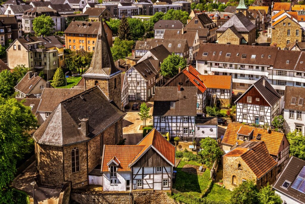 An aerial view of traditional German housing, with tightly packed homes in a dense urban neighborhood, showcasing the architectural beauty of the region.