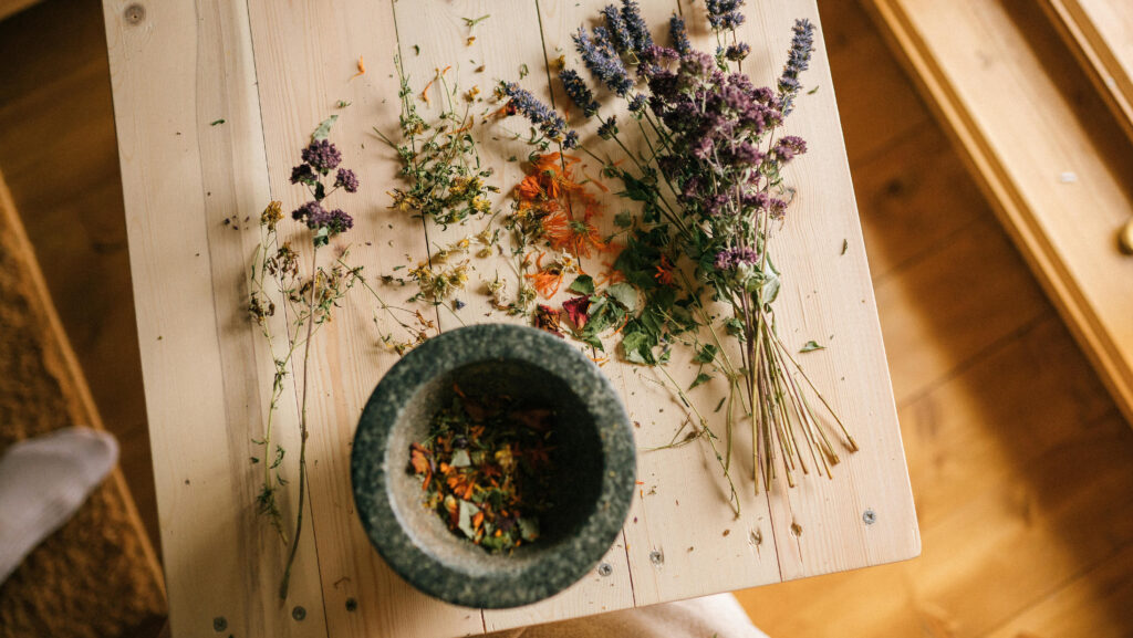 A table with a bouquet of dried flowers, creating a peaceful and calming atmosphere, symbolizing the serene environment of a psilocybin service center.