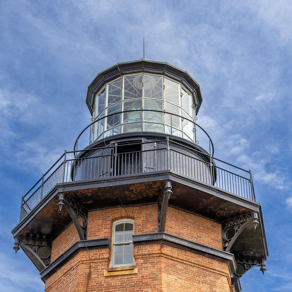 Close-up of a historic Rhode Island lighthouse, symbolizing expertise in Rhode Island cannabis consulting.