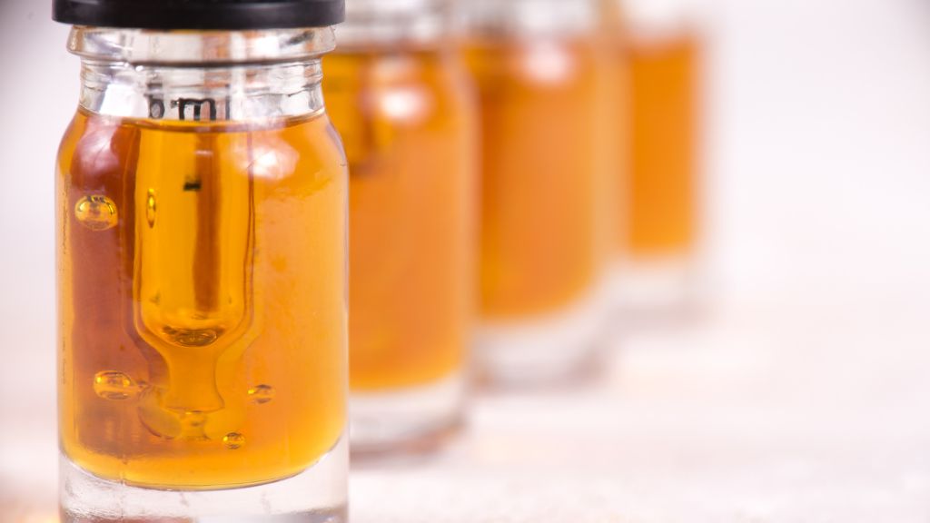 Solventless Extraction using Ice Water Extraction method shown in jars of resin