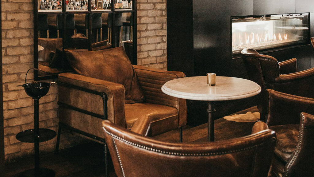 Interior view of a modern cannabis consumption lounge with stylish seating