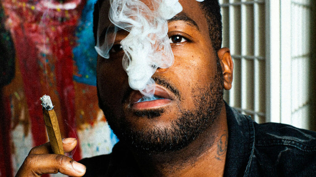 Man smoking cannabis at a Missouri-style private lounge