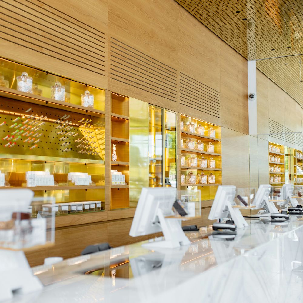 Cannabis dispensary checkout counter with multiple POS systems for fast service