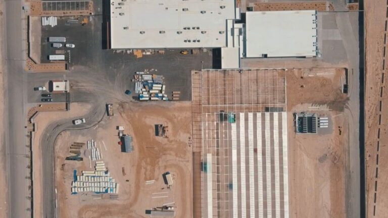 Aerial view of the Aether Gardens construction site during the early facility design and master planning phase.