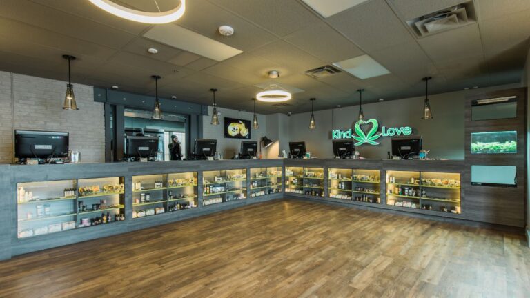 Interior of Kind Love retail dispensary featuring multiple budtender stations and an open, modern floor plan.